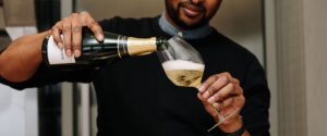 close up of man pouring Champagne